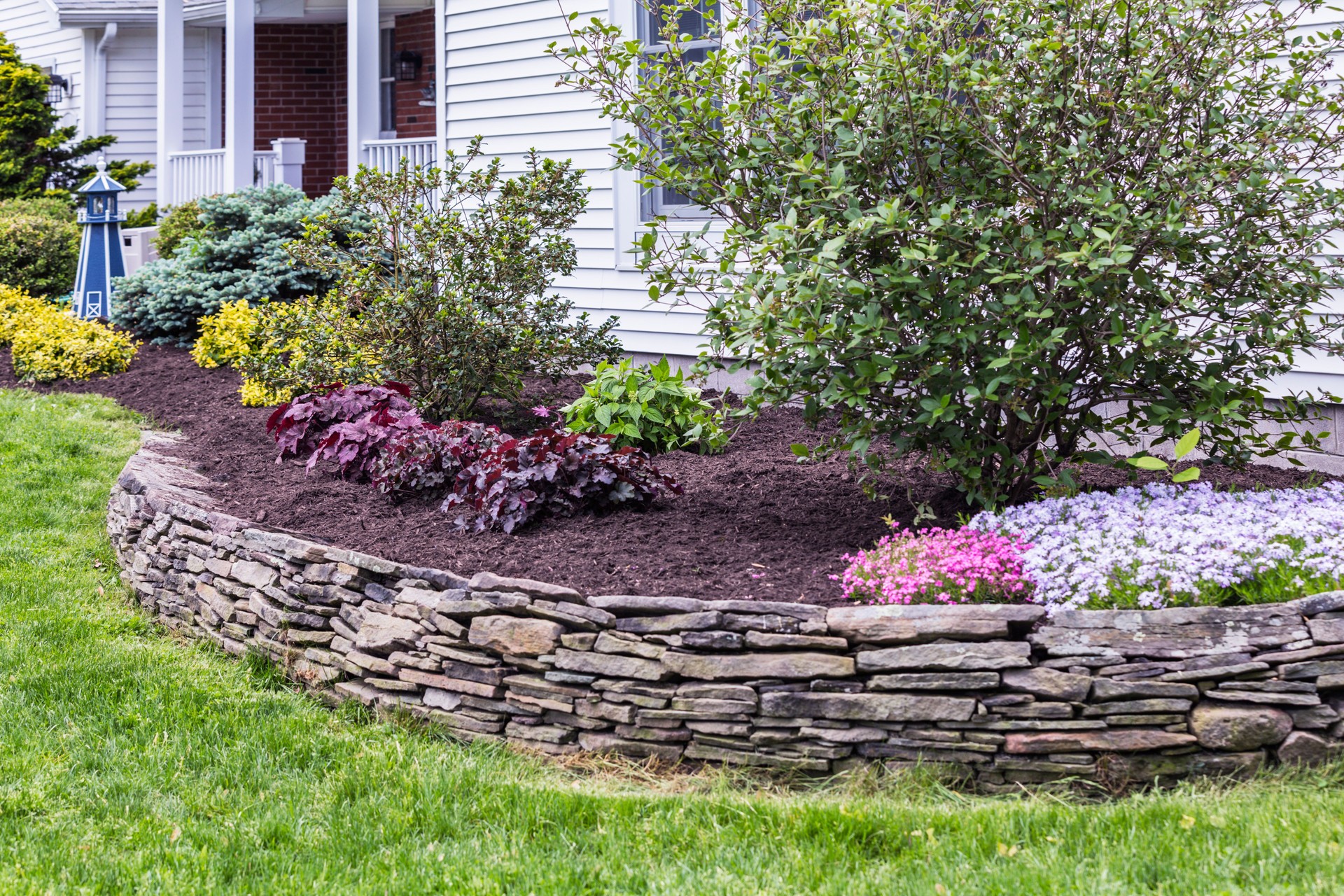 New Mulch Behind Landscaped Garden Terrace Wall